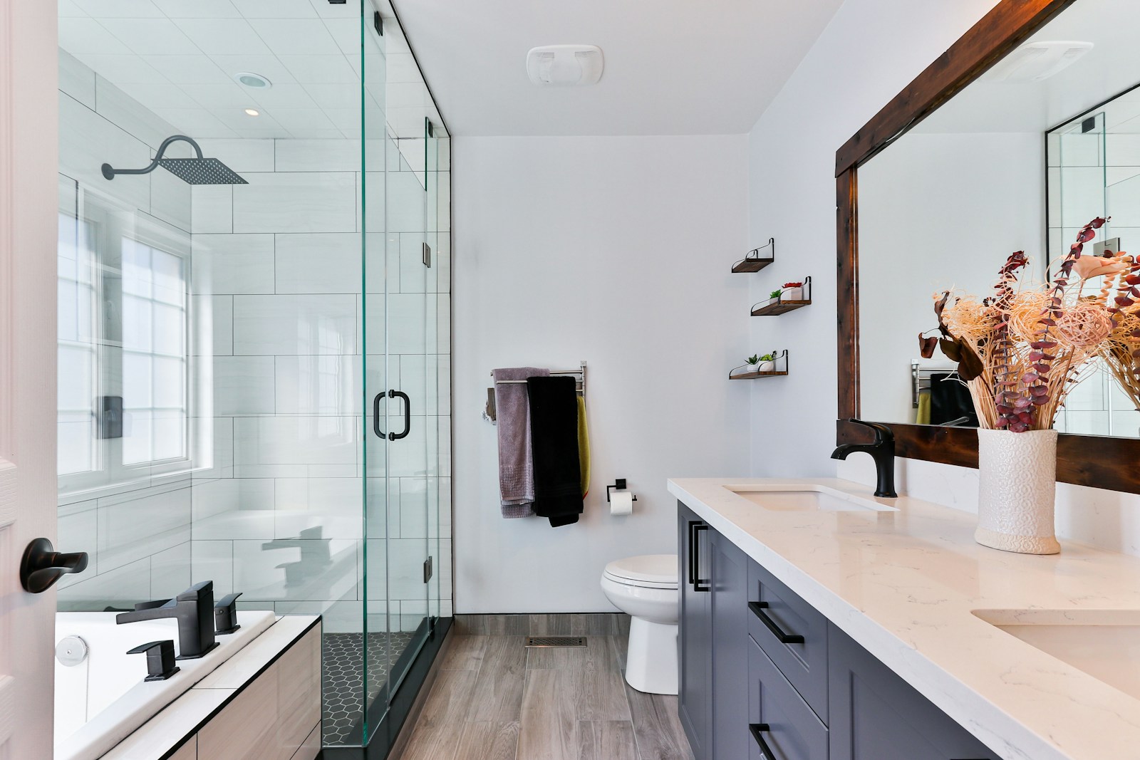 Luxury bathroom with freestanding bath and stone walls
