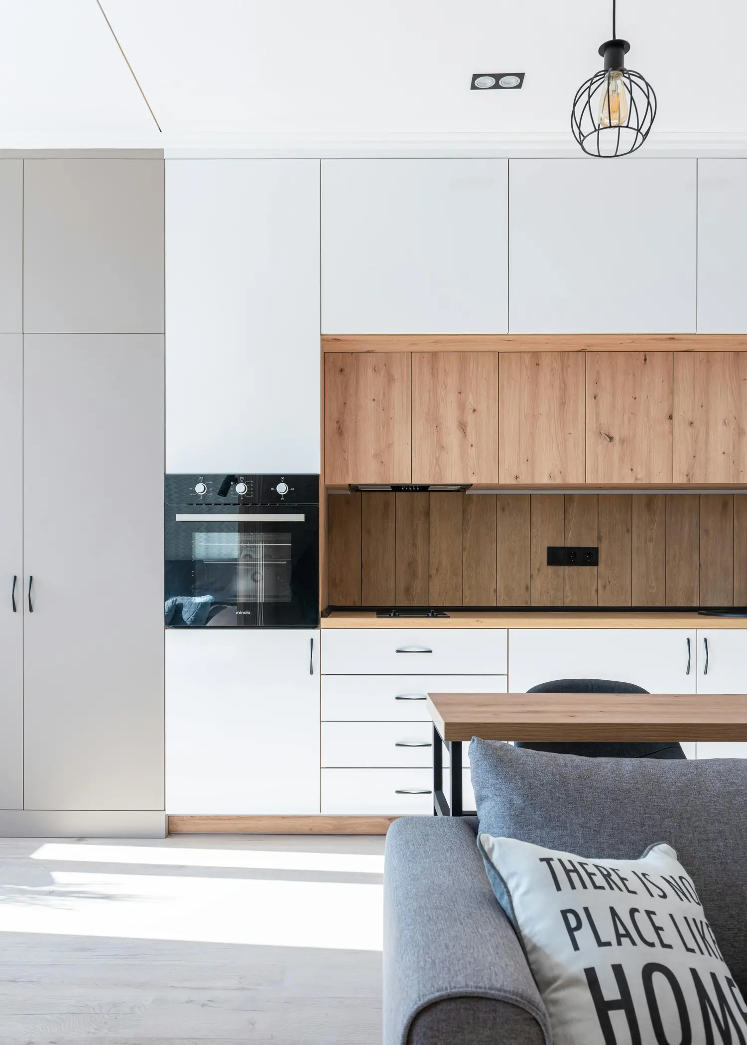 Bespoke kitchen with timber cabinetry and stone worktop
